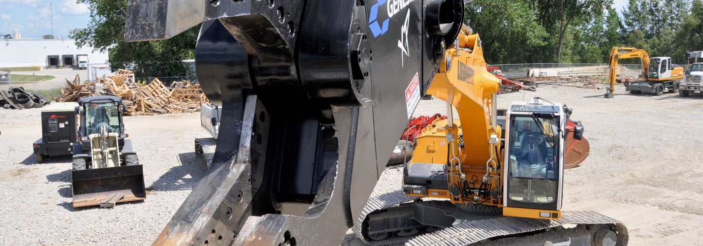 Geith hydraulic attachment mounted on an excavator in the Norwalk equipment yard