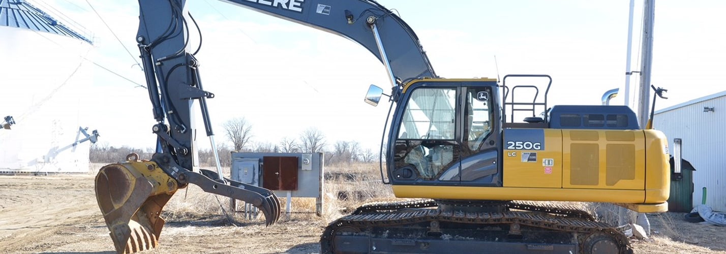 John Deere 250G LC excavator parked at the shop ready for inspection
